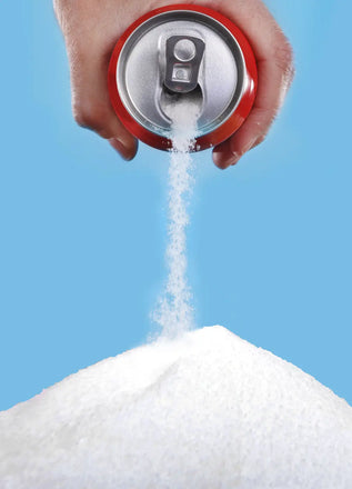 Image d'une cannette de soda qui verse du sucre.